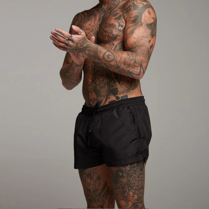 Trendy men's quick-dry swim shorts, versatile for summer fashion, pool, or vacation wear.