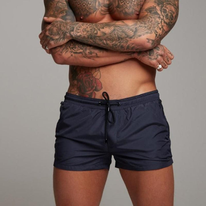 Comfortable men's quick-dry beach shorts, ideal for swimming, summer, and casual resort style.