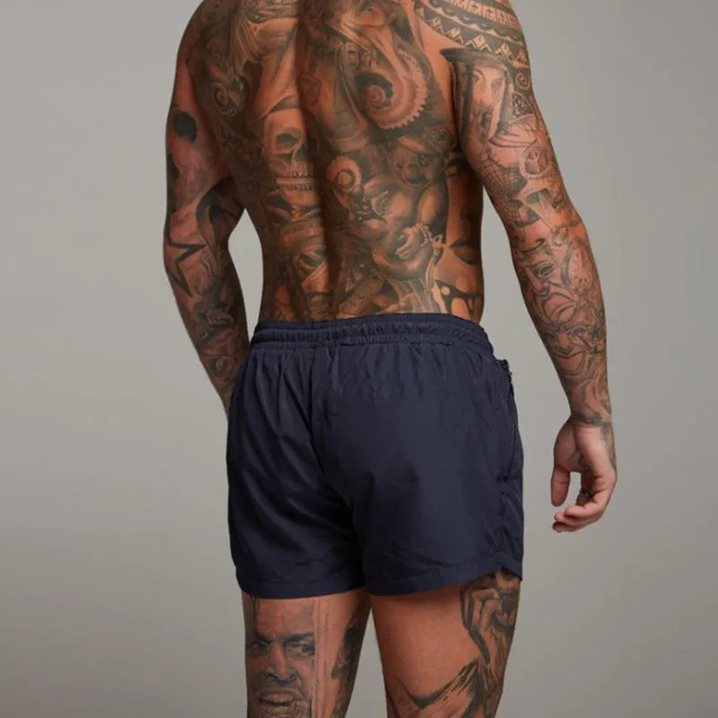 Zippered men's quick-dry swim shorts, perfect for beach, pool, and summer vacation adventures.