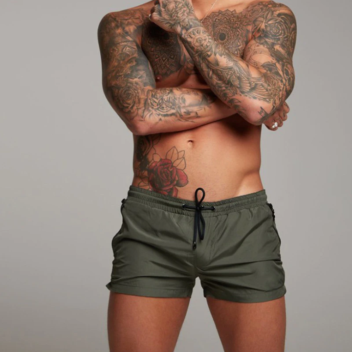 Men's quick-dry swim shorts in a vibrant pattern, ideal for stylish beach and summer fashion.