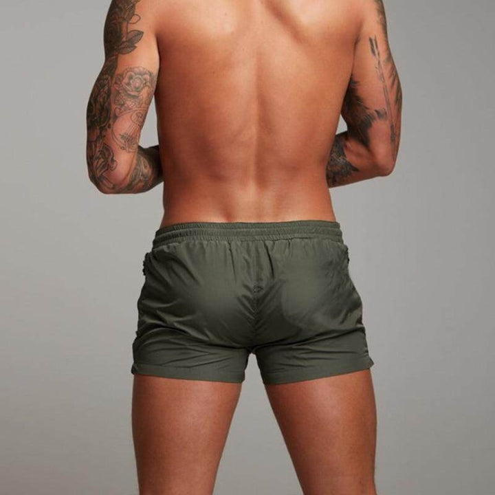 Modern men's quick-dry beach shorts, perfect for active summer days and lightweight comfort.