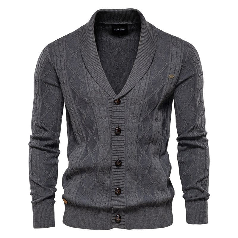 Textured men's cable knit cardigan, V-neck, and stylish shawl collar for smart casual wear.