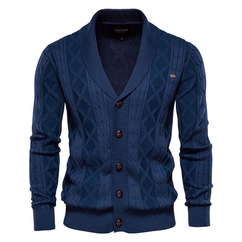 Intricate cable knit men's cardigan featuring a comfortable V-neck and elegant shawl collar; versatile knitwear.