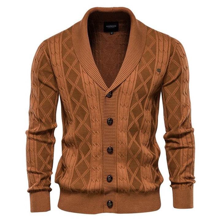 Men's V-neck cardigan with a distinctive cable knit pattern and a luxurious shawl collar for warmth.