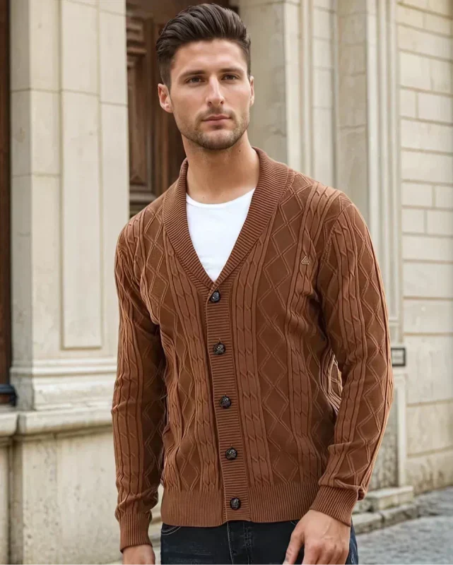 Stylish men's cable knit V-neck cardigan, shawl collar. A textured knitwear piece for casual winter looks.