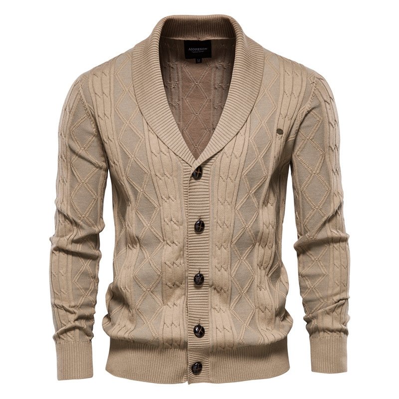 Comfortable men's cable knit V-neck cardigan with a sophisticated shawl collar for smart casual winter fashion.