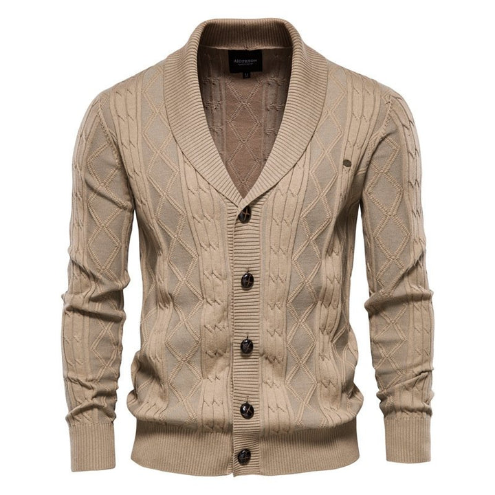 Comfortable men's cable knit V-neck cardigan with a sophisticated shawl collar for smart casual winter fashion.