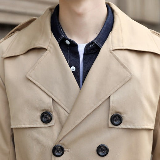 Men's autumn trench coat, classic double-breasted with a cinching belt. Elegant long coat for winter fashion.