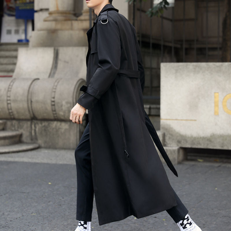 Timeless men's double-breasted trench coat with adjustable belt. Premium long coat, perfect for sophisticated winter fashion.