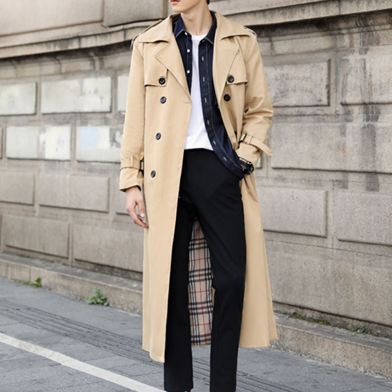 Classic men's double-breasted trench coat with belt. Sophisticated outerwear for autumn and winter fashion.