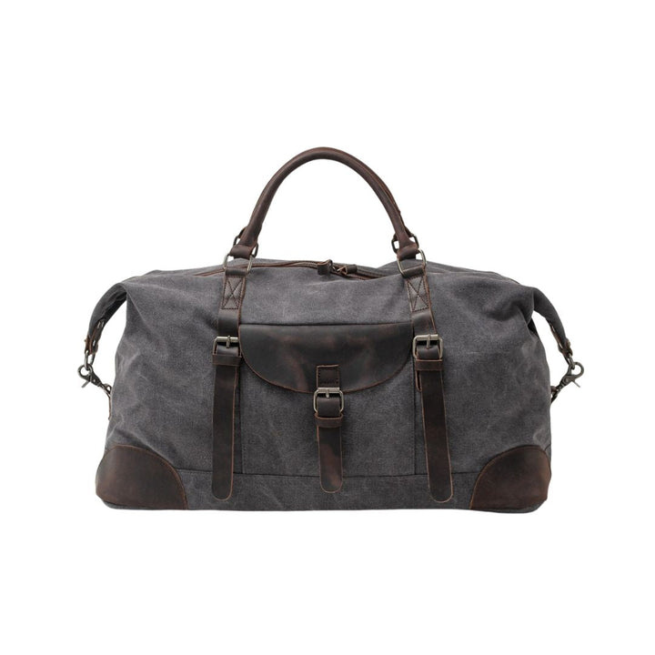 Modern men's shoulder duffle bag, made from durable canvas. Great for travel, can be carried crossbody.