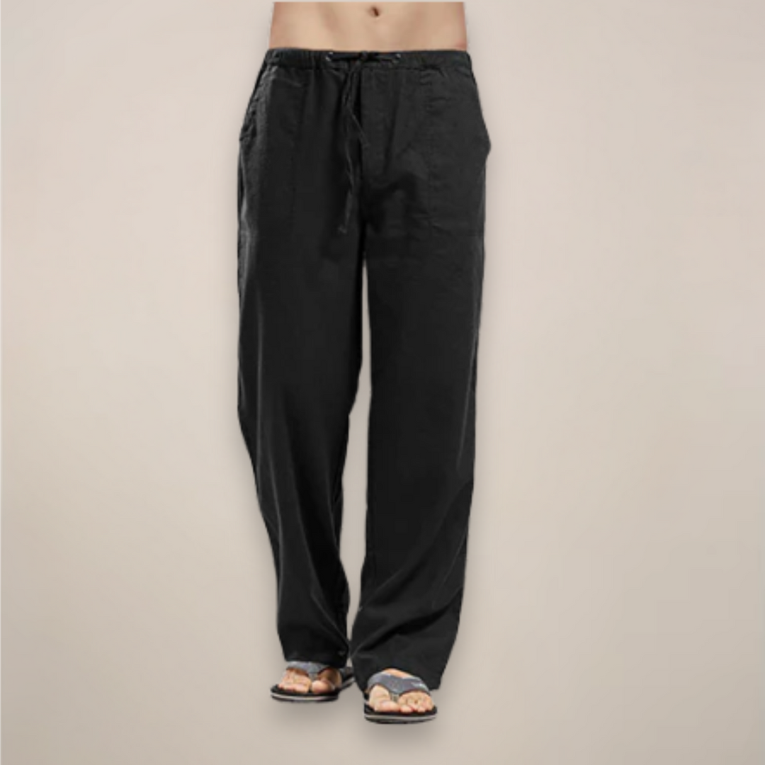 White men's relaxed fit pants with adjustable drawstring, offering lightweight comfort for casual spring/summer style.