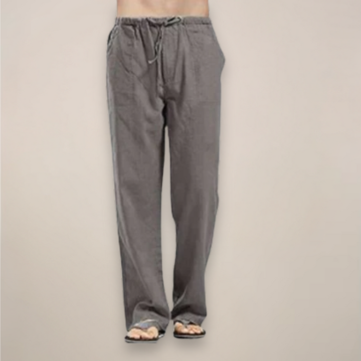 Comfortable men's white relaxed fit drawstring pants, perfect for casual spring, summer, or lounge wear. Lightweight fabric.