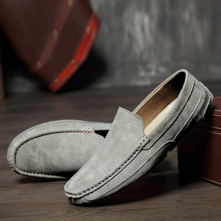 Classic men's slip-on moccasin loafers, practical and stylish office footwear for daily wear.