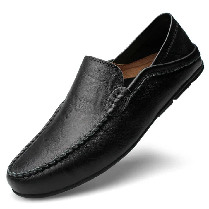 Classic men's slip-on loafers in black leather, ideal for professional workwear and business casual attire.