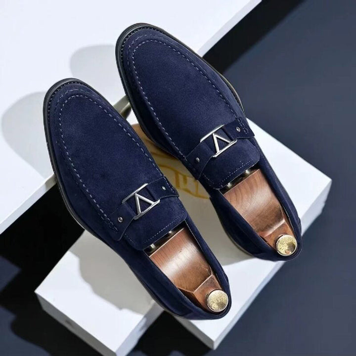 Stylish black men's slip-on loafers for professional business attire or elegant formal events.