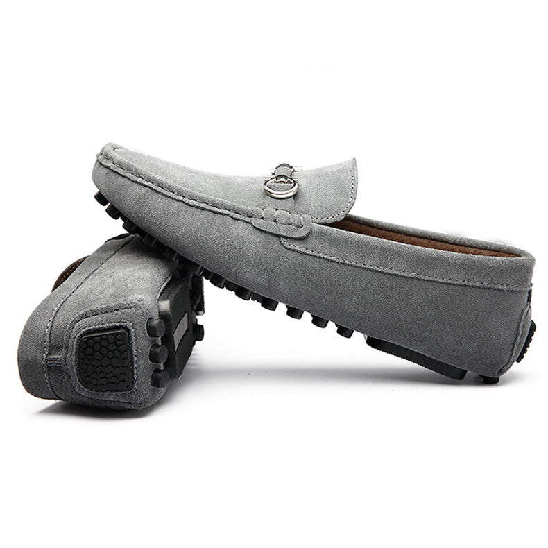 Men's fashion grey slip-on moccasin loafers. Stylish and comfortable driving shoes for casual wear.