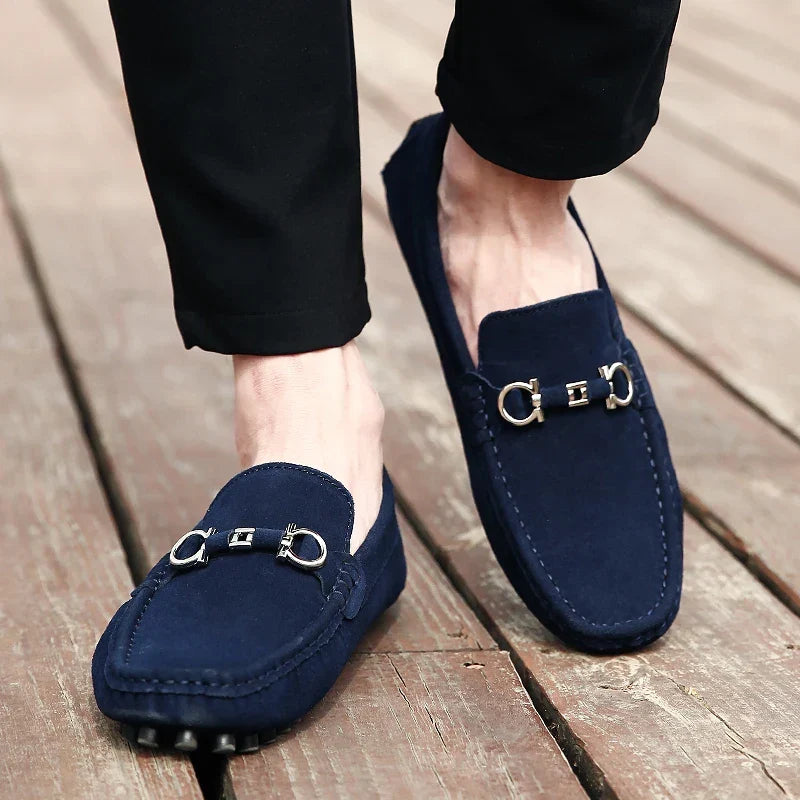 Grey men's casual slip-on loafers. Moccasin style driving shoes for comfortable everyday fashion.