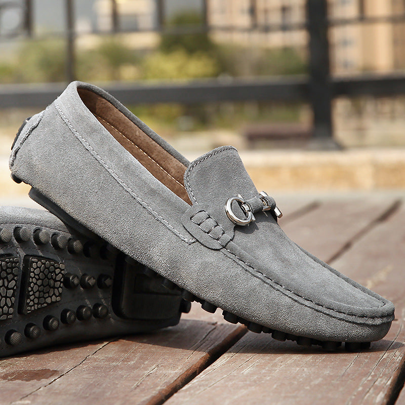 Top view of navy men's slip-on loafers, highlighting ease and comfort. Stylish casual moccasin shoes.