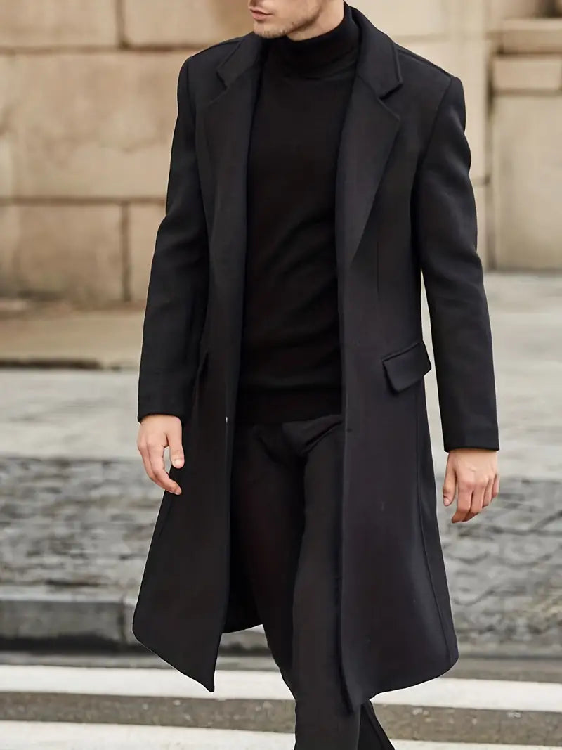 Men's slim fit long trench coat with notched lapel. Classic men's outerwear, perfect for fall and winter style.