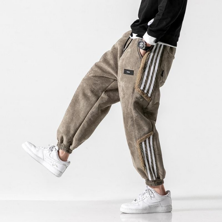 Trendy men's baggy trackpants, offering an urban edge and relaxed fit for everyday comfort and style.