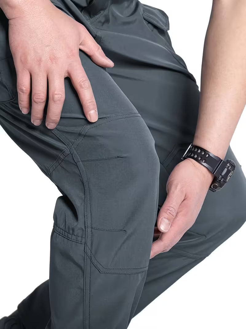 Army green men's tactical cargo pants, offering comfort and resilience for outdoor wear.