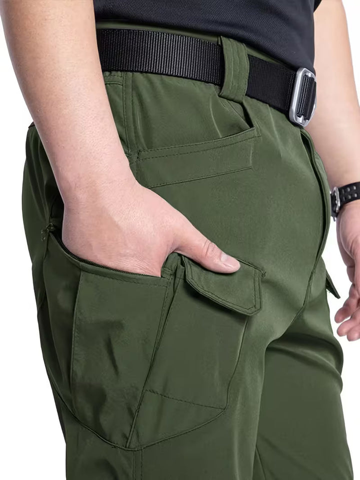 Sleek men's black cargo utility pants, tapered fit for a modern and functional look.