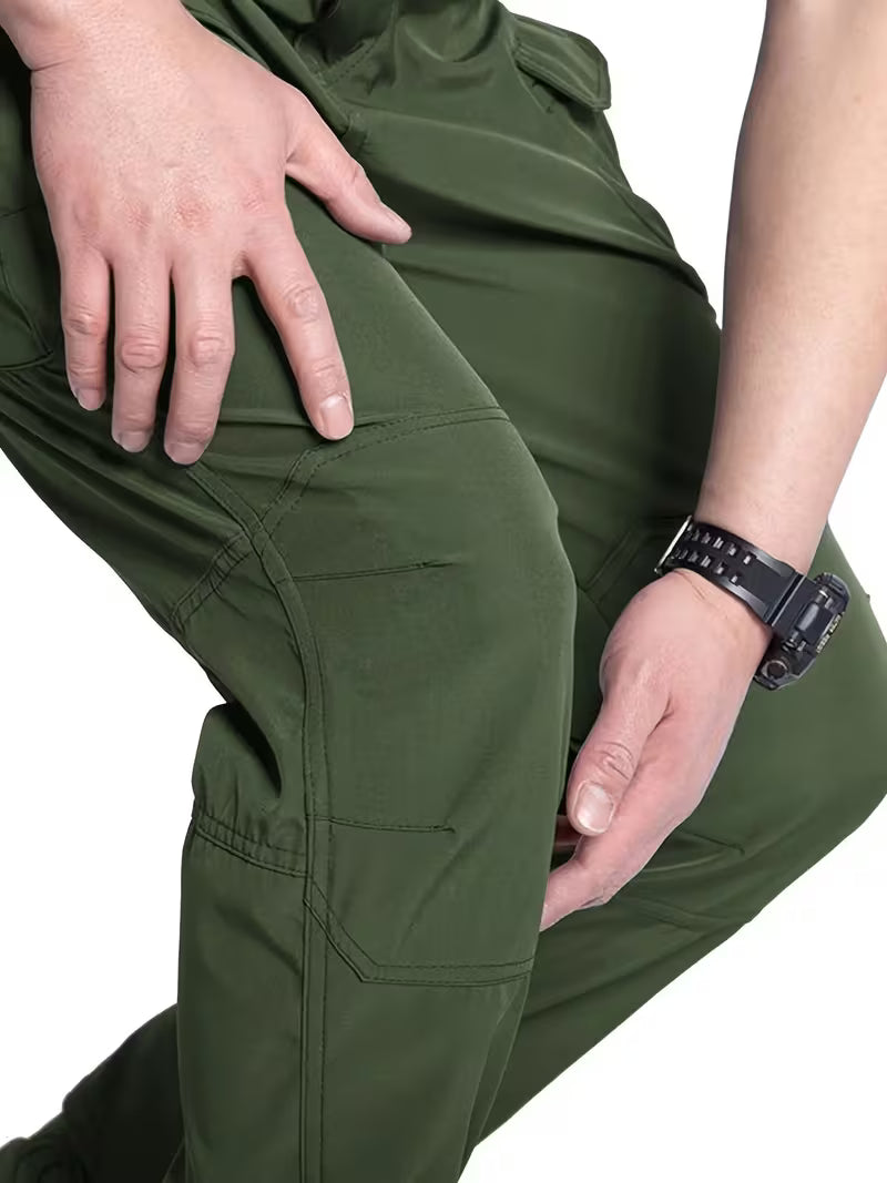 Rugged men's army green cargo pants, ideal for outdoor work and tactical situations.