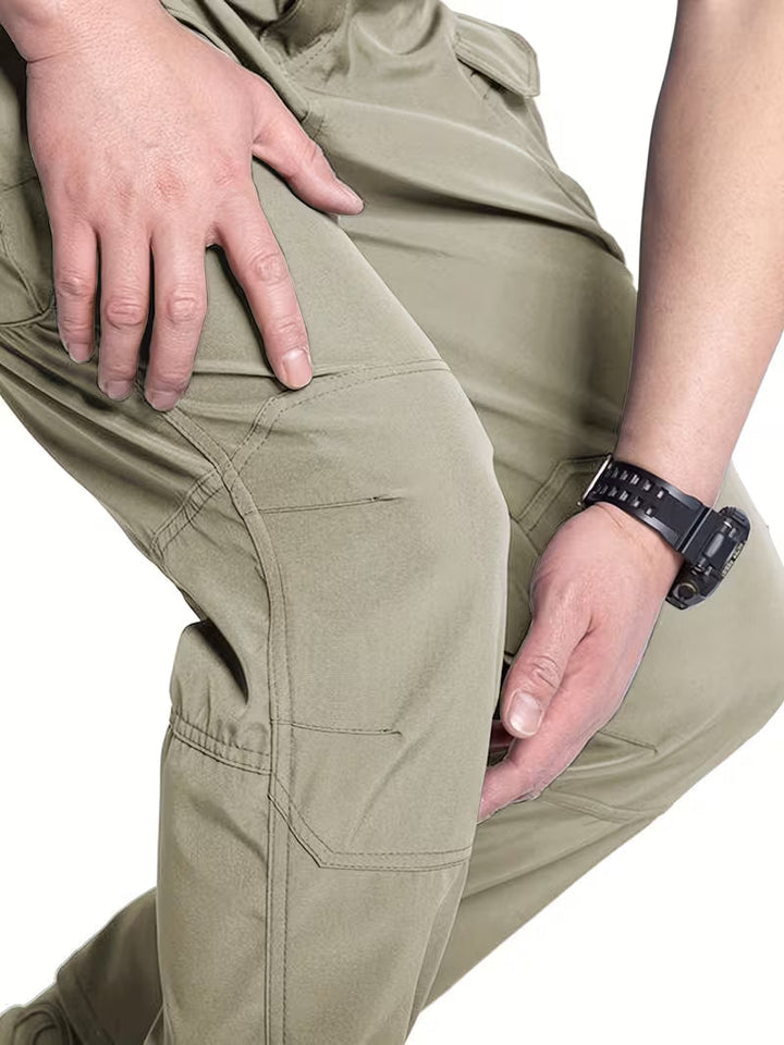 Army green men's durable cargo pants, perfect for rugged workwear and outdoor activities.