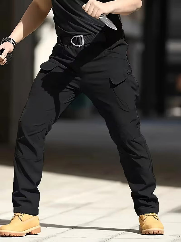 Heavy-duty men's tactical cargo pants, durable & comfortable for active work.