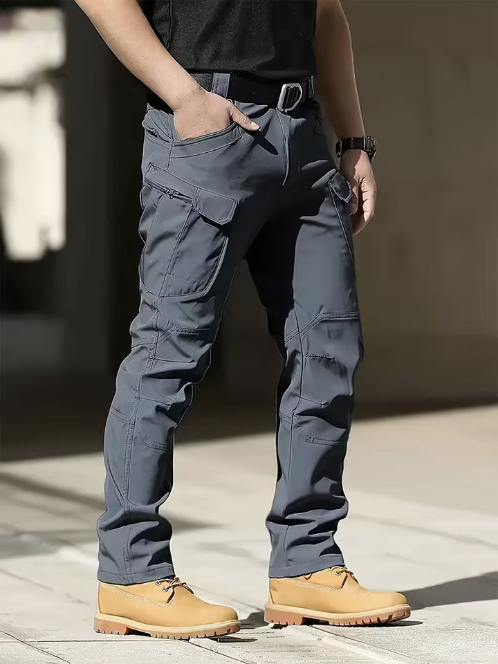 Durable men's cargo workwear pants with ample storage in multi-functional pockets.
