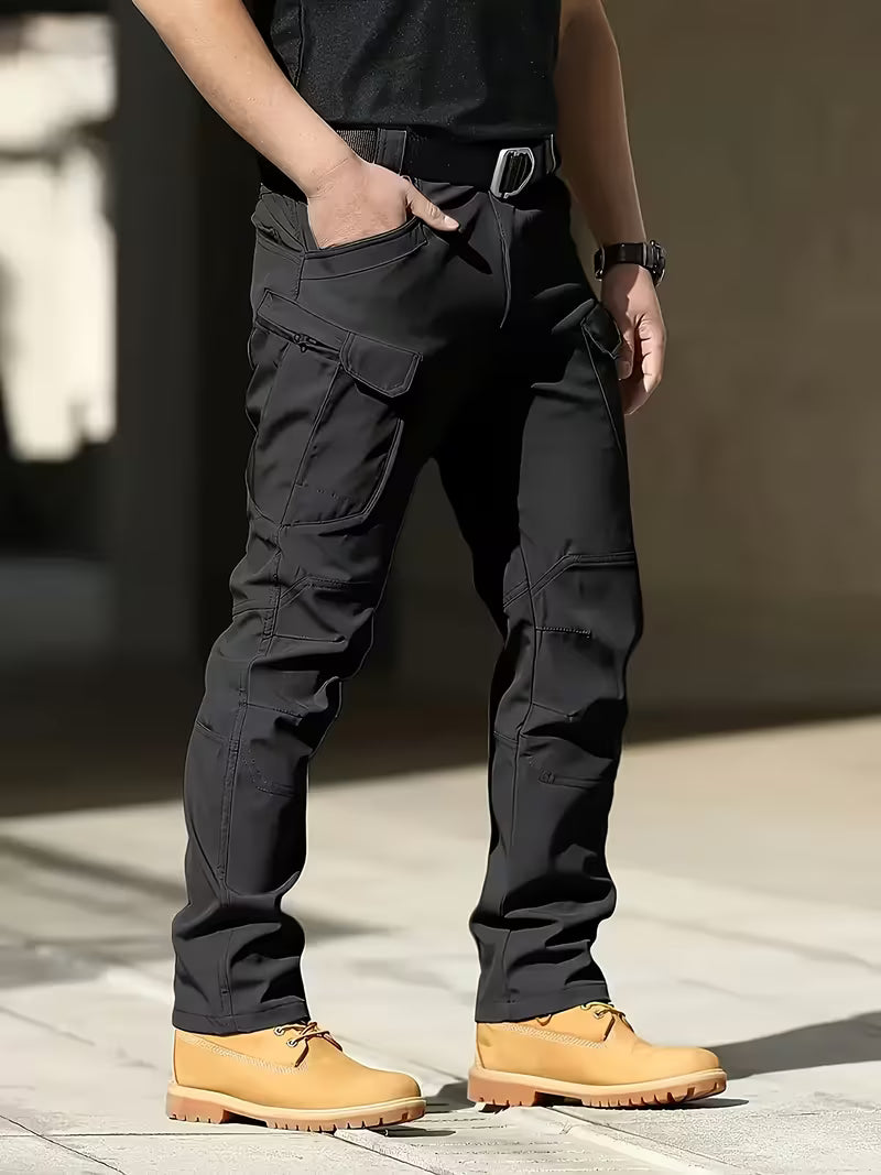 Men's durable cargo work pants with multiple utility pockets for heavy-duty tasks.