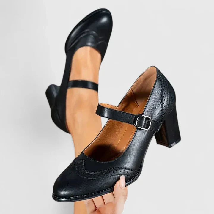 Classic women's Mary Jane shoes featuring a stylish buckle strap & comfortable block heel for elegance.