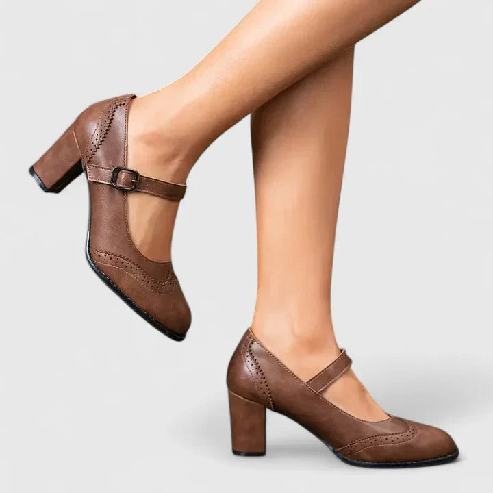 Classic women's Mary Jane shoes with a comfortable block heel and elegant buckle strap for timeless style.