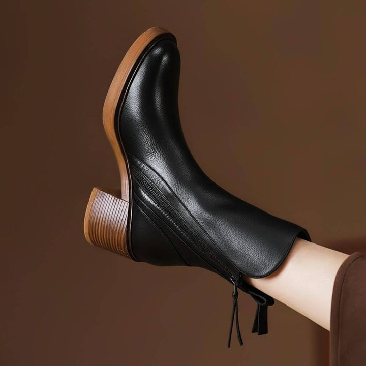Versatile women's elegant leather ankle boots. Block heel provides comfort & style for all-day fashion wear.