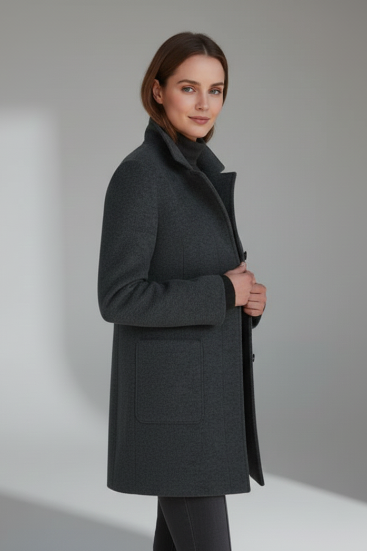 Elegant women's mid-length stand collar coat with sophisticated button closure, suitable for everyday wear.