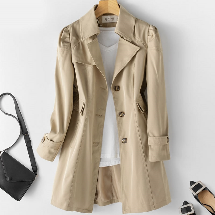 Elegant women's mid-length trench coat, classic design for stylish fall & spring outerwear.
