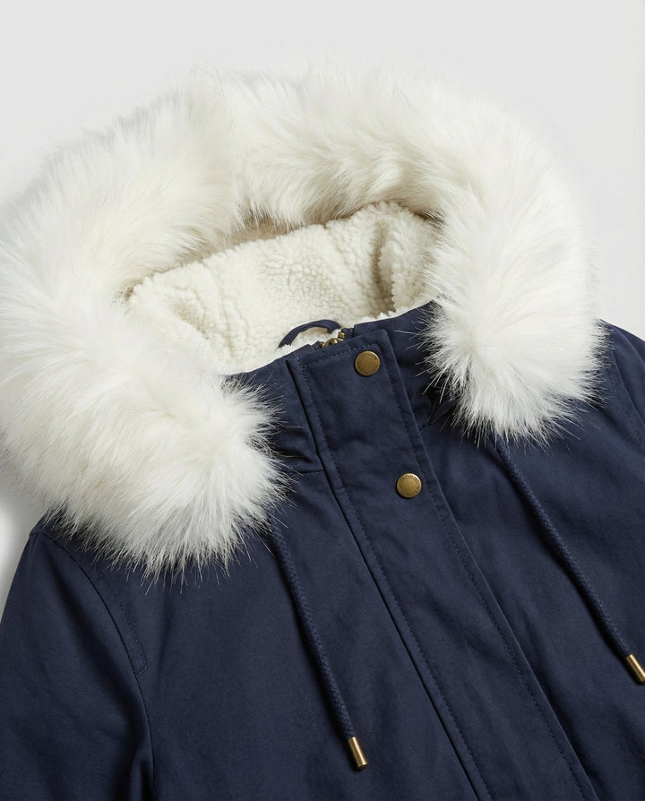 Women's cozy mid-length parka, ideal winter jacket for cool weather, stylish & functional.