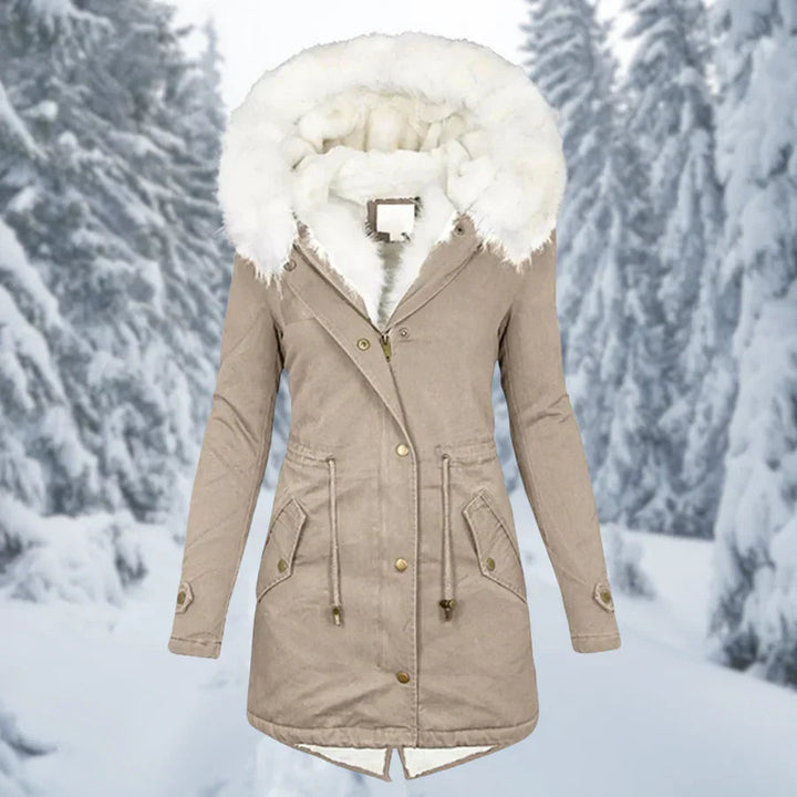 Women's warm mid-length hooded parka, durable winter jacket with an adjustable waist for comfort.