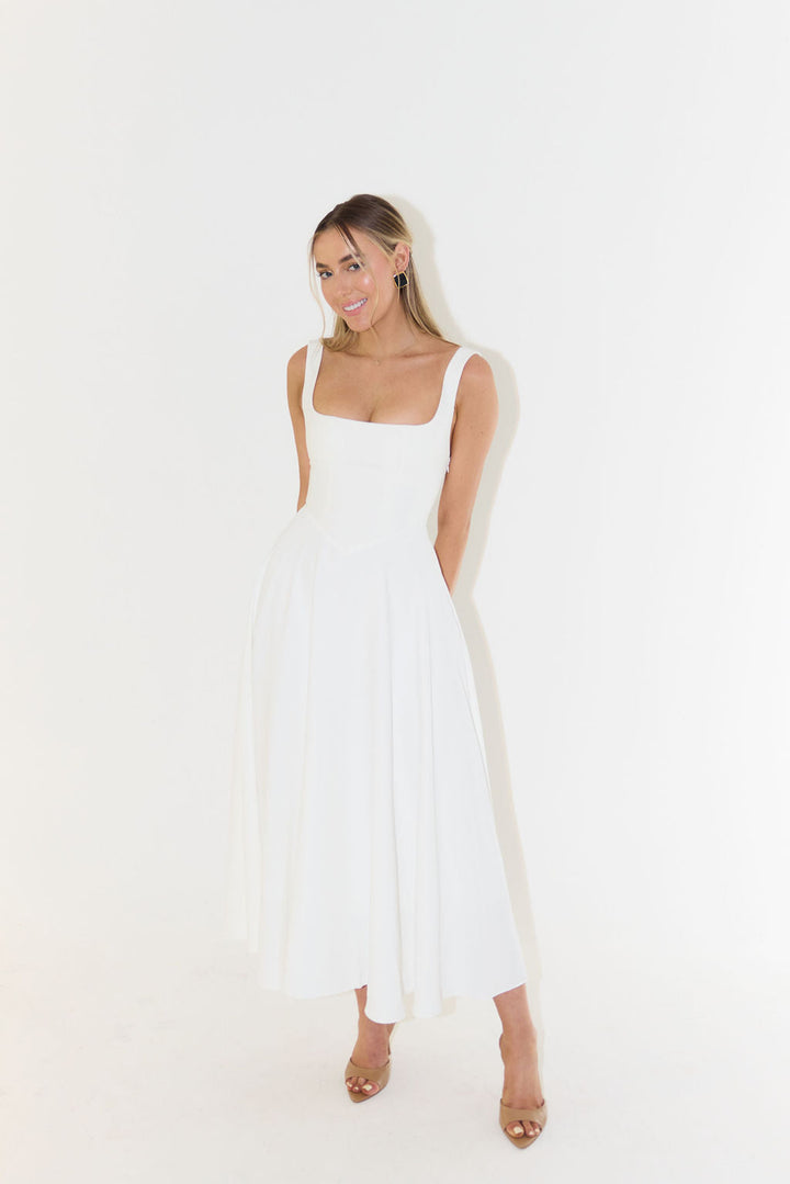 Chic women's square neck midi dress, elegant & versatile for summer parties, cocktails, and fashion.