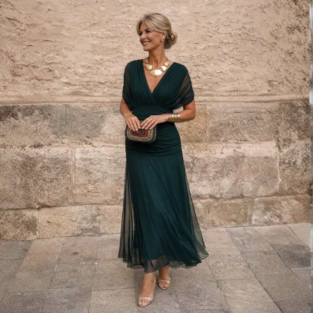 Elegant off-shoulder maxi dress for women, perfect for formal events & evening wear.