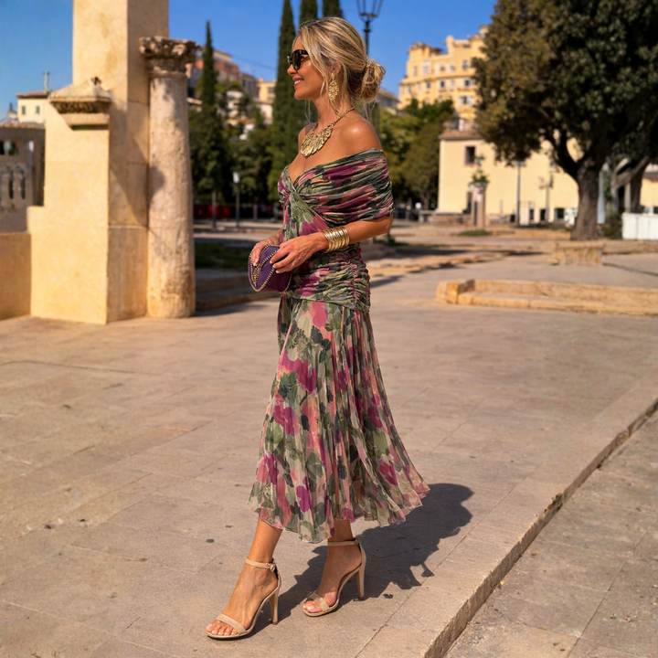 Sophisticated off-shoulder maxi gown for women, ideal formal attire for special occasions.