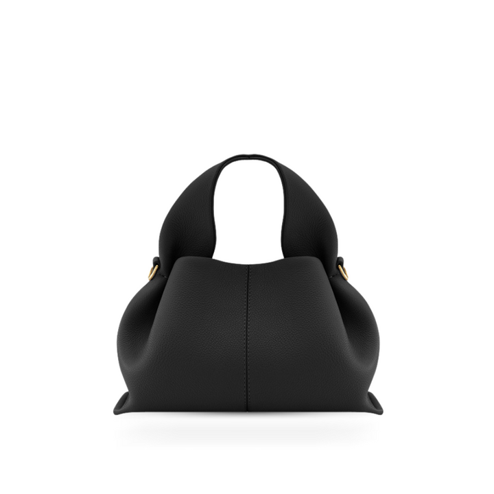 Versatile faux leather shoulder bag for women, featuring a convenient magnetic closure for everyday use.