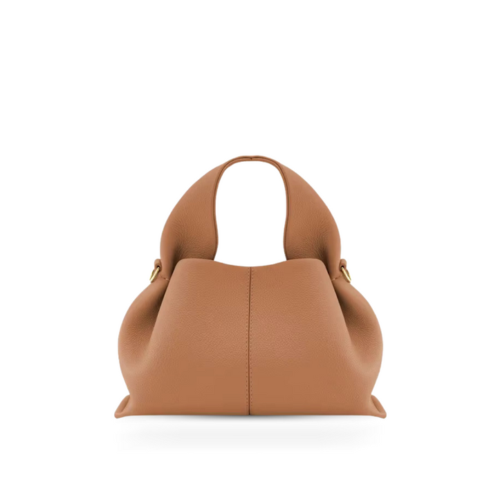 Elegant women's shoulder bag with secure magnetic clasp, perfect for daily essentials and a stylish look.