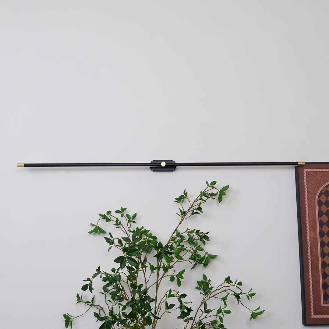 Black finish linear wall light, integrated LED, modern bedroom.