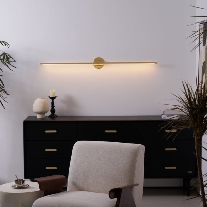 Hardwired gold linear LED fixture, minimalist, modern home.