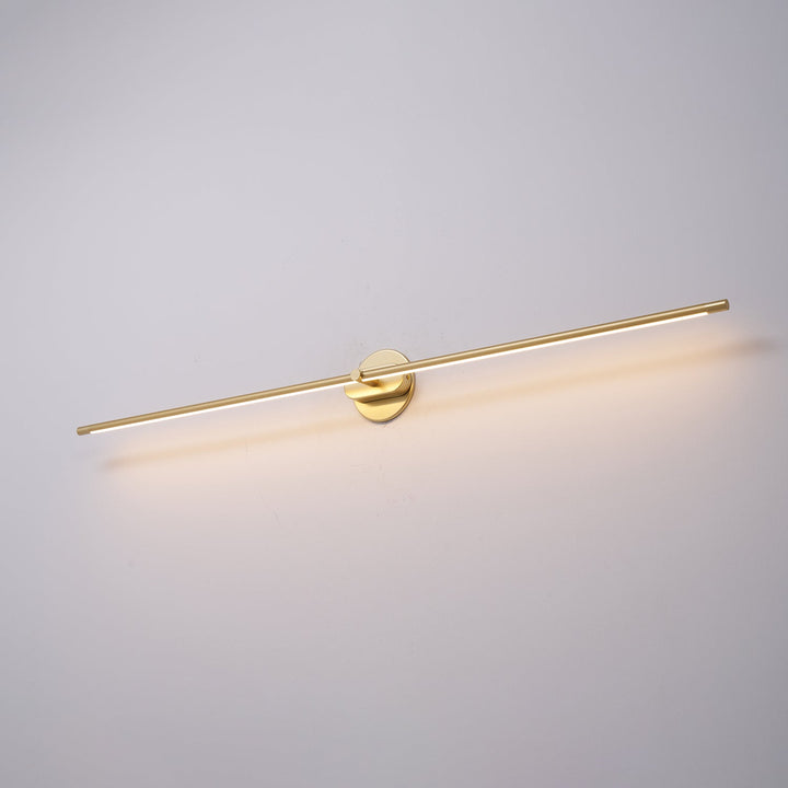 Energy-efficient gold linear wall fixture, minimalist hallway.