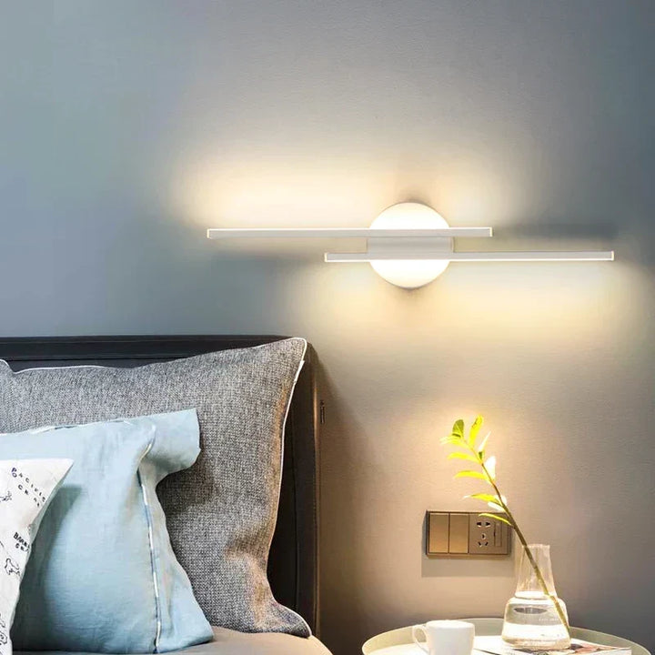 Modern dimmable LED wall sconce, providing adjustable ambient lighting for living rooms or offices.