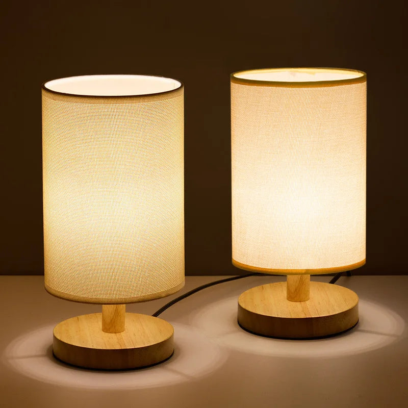 USB dimmable LED table lamp with real wood base. Organic design for bedside or modern desk.