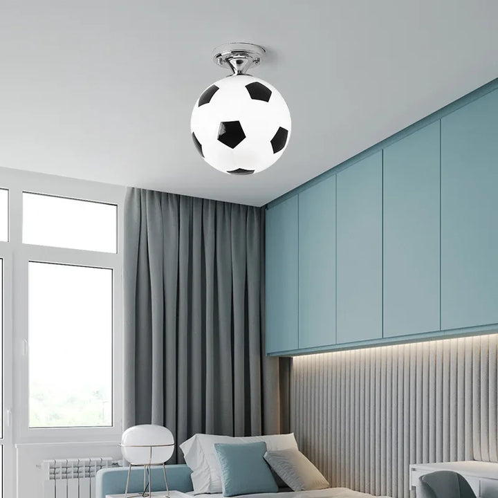 Kids' LED ceiling light with football & basketball designs, perfect for playrooms & bedrooms. Bright sports decor.